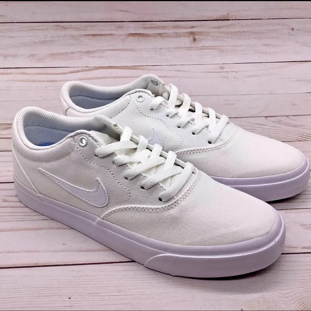 Nike SB Charge CNVS White CD6279-100
New in box missing lid Men’s size 11